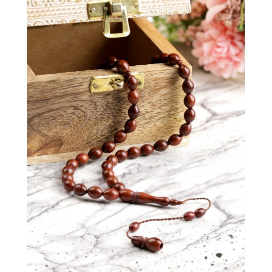 Rosary of elegant cook wood in a brown color